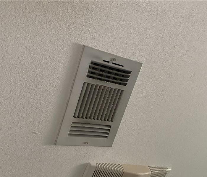 Filthy AC vent that has been collecting dust and needs to be cleaned